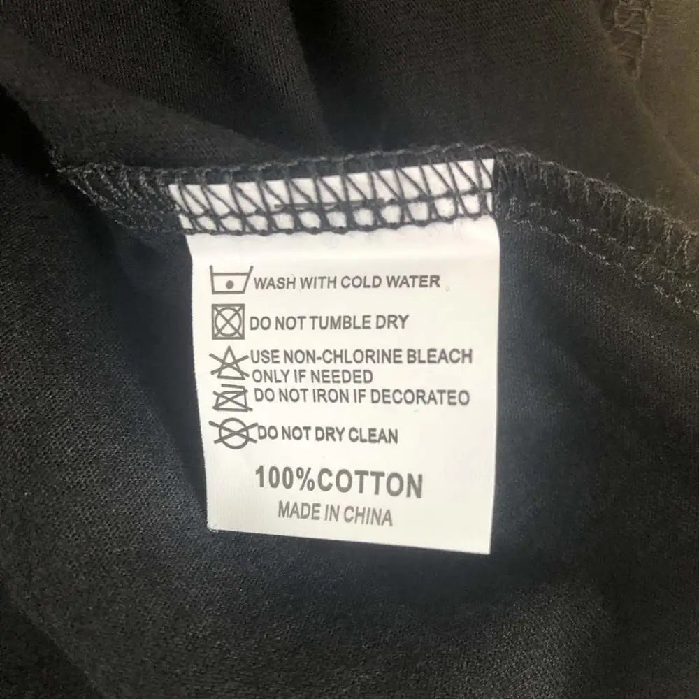 BC Faith Over Fear Christian T-Shirt in soft pink with black graphic slogan, styled with casual shoes, sunglasses, and roses for women’s fashion.